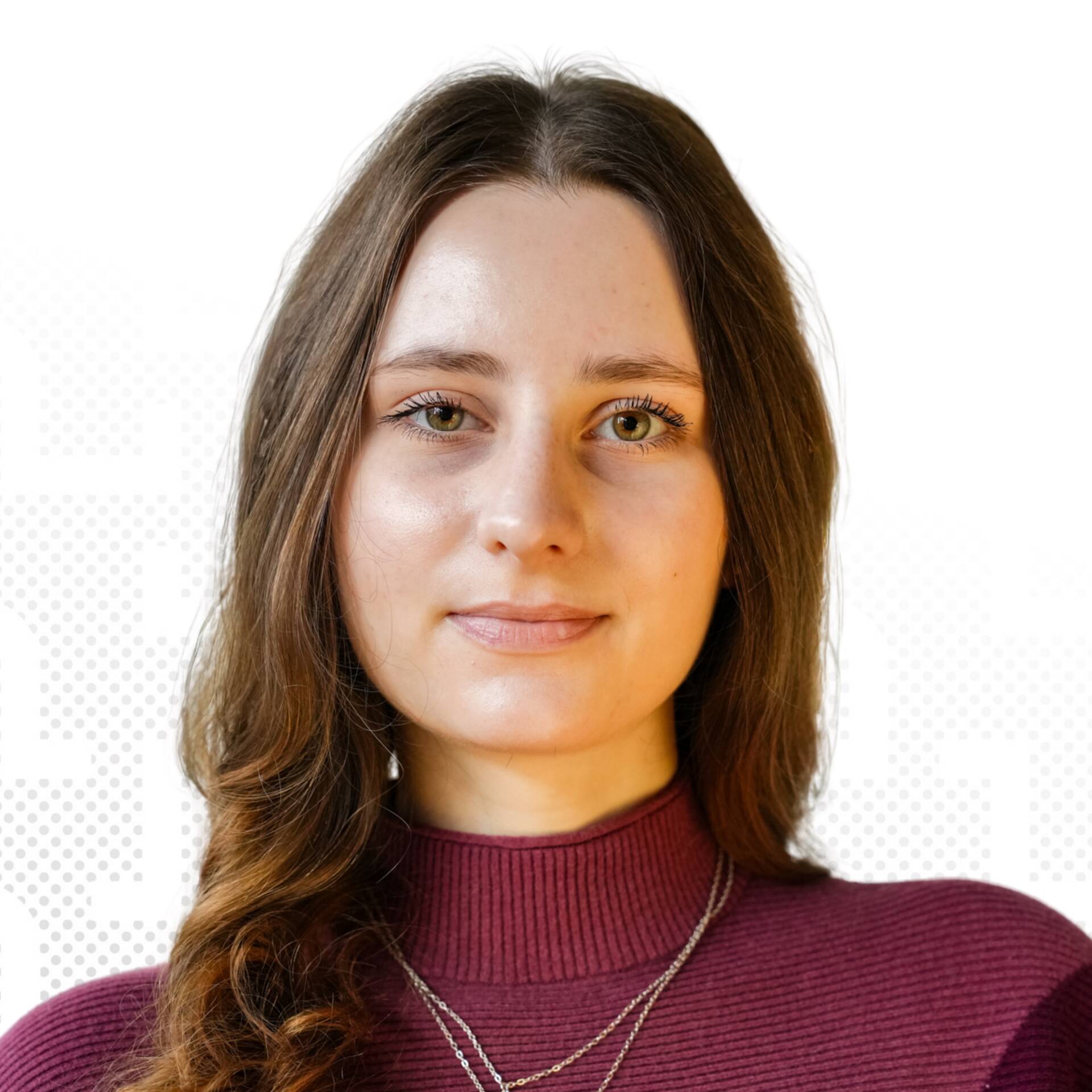 A professional business portrait of Amelie Goiny in front of a light-coloured background.