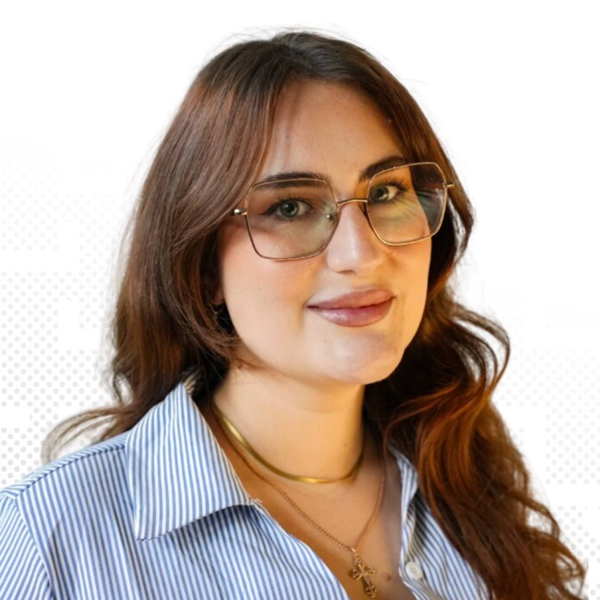 A professional business portrait of Bella Klug in front of a light-coloured background.