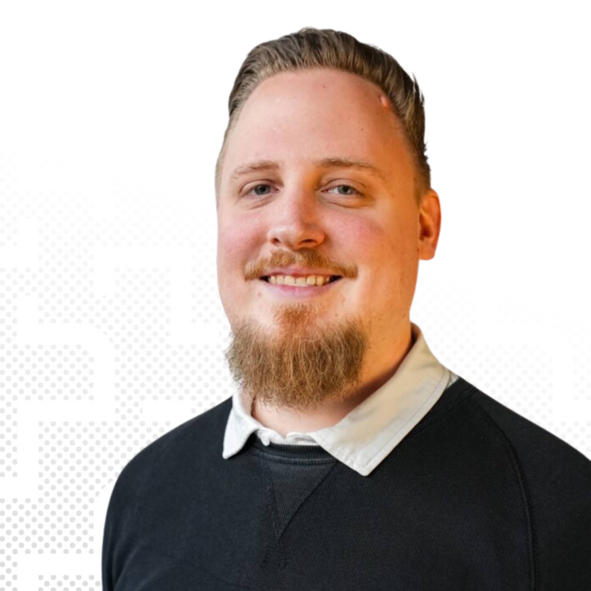 A professional business portrait of David Schmidt with black hair in front of a white background.