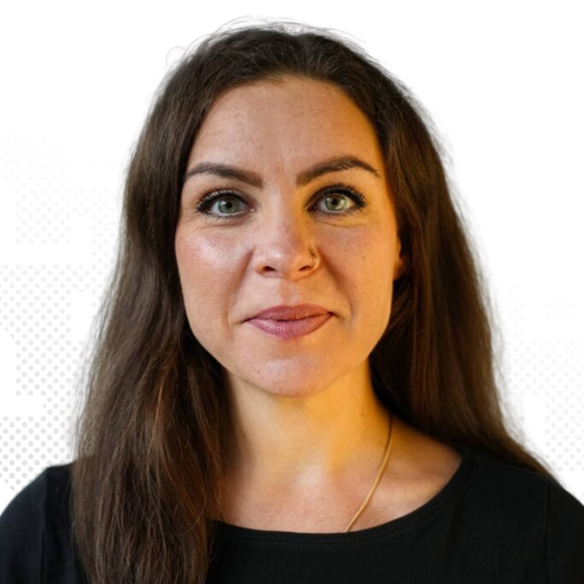 A professional business portrait of Julia Zaides-Kara with black hair in front of a white background.