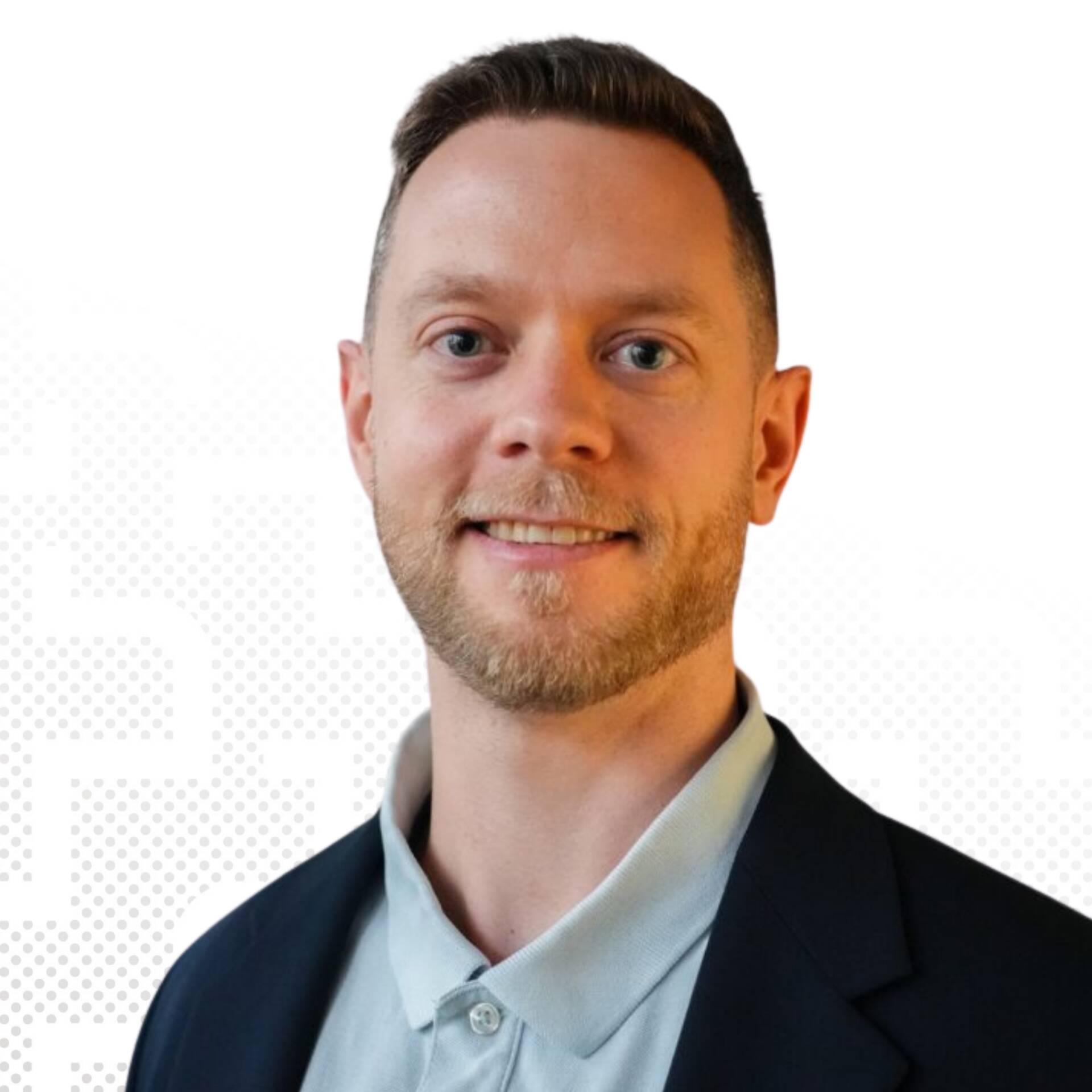A professional business portrait of Paul Feustel with black hair against a white background.
