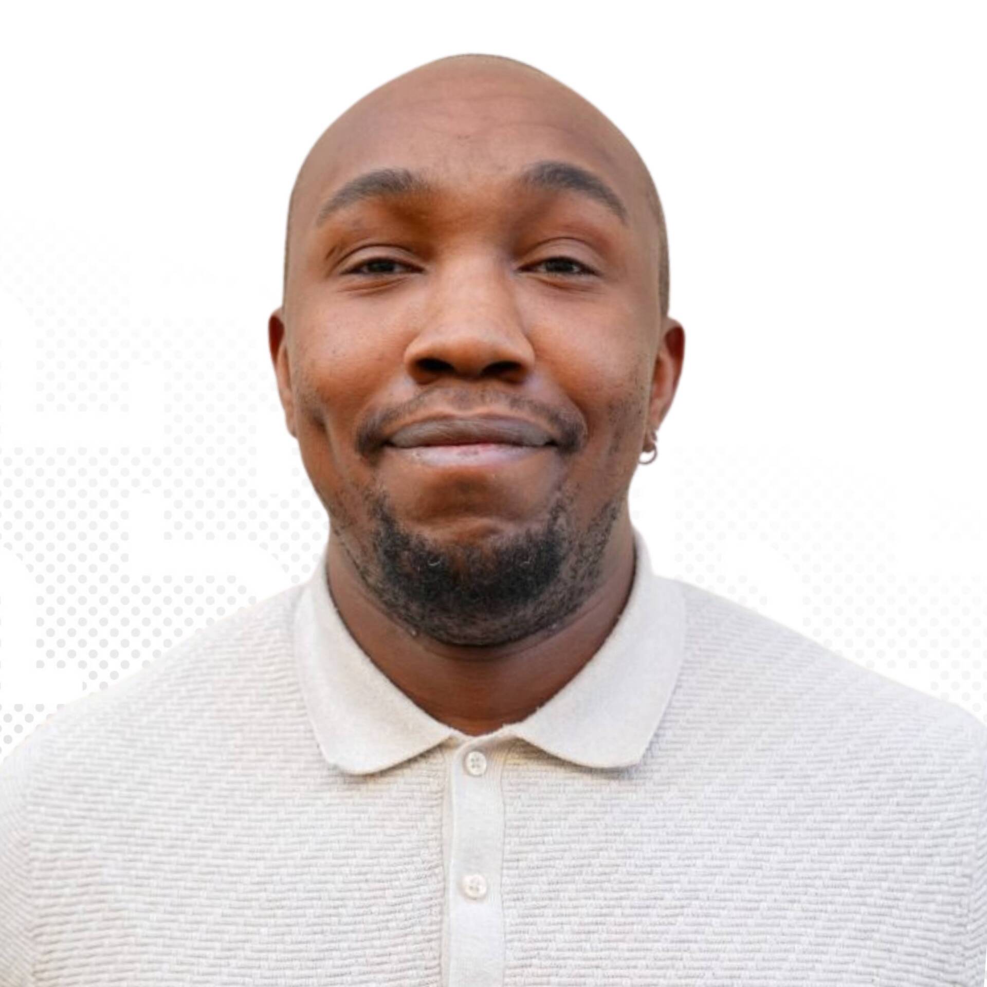 A professional business portrait of Tahsin Schmiedke in front of a white background.