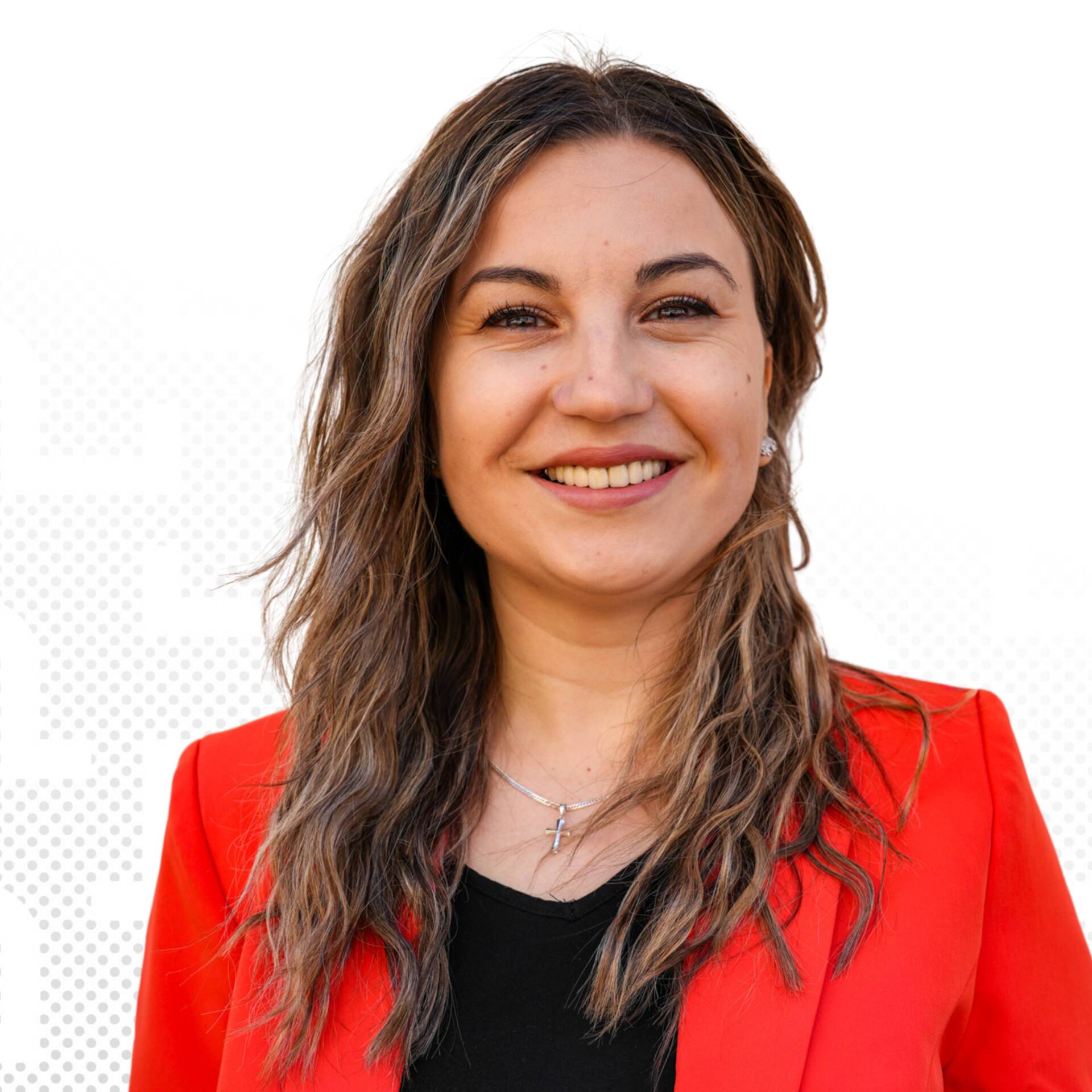 A professional business portrait of Teodora Todorova in a red blazer against a white background.